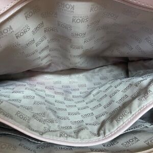 Large tan color Nine West Handbag used like new. Very clean